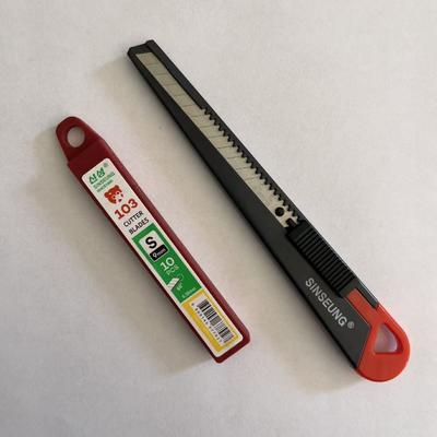 0.38mm dày 9mm Cutter Retractable Safety Blade Thép carbon cao Lắp đầy lưỡi để bọc